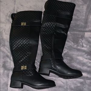Black quilted boots *never worn*